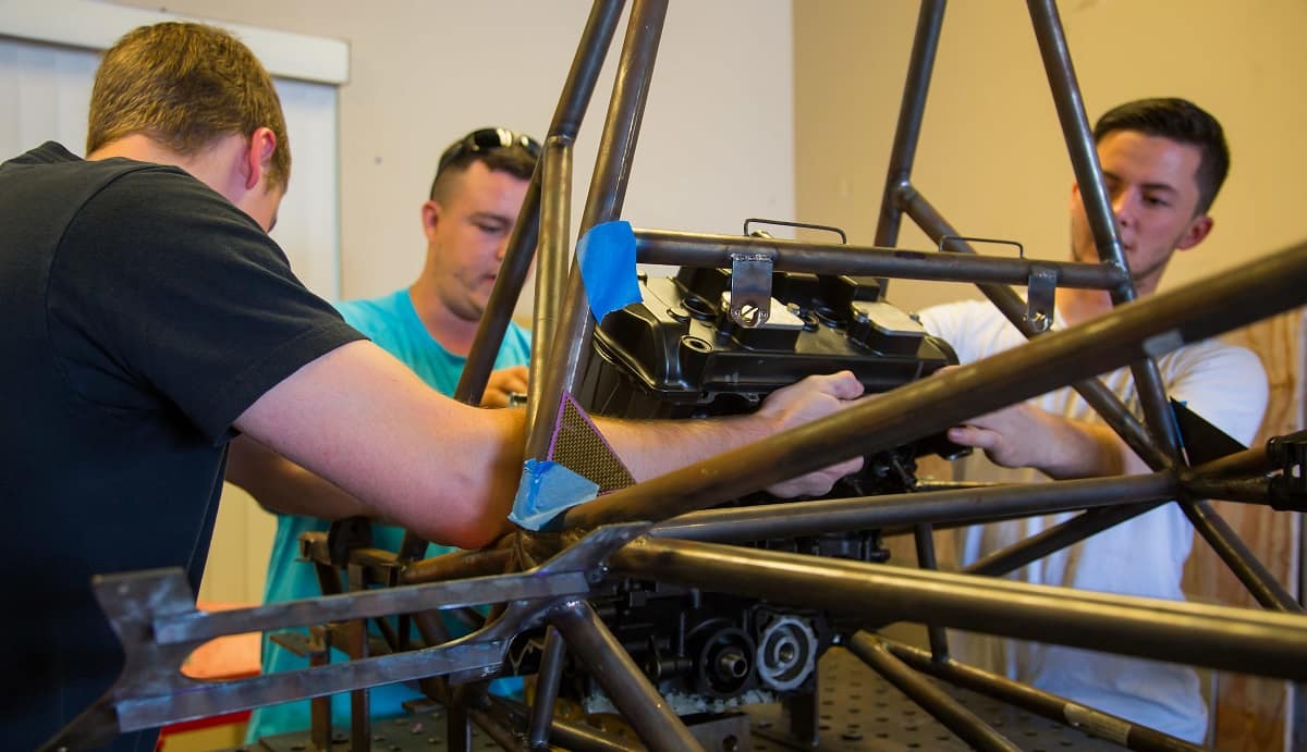 Embry-Riddle Engineering students work on their Formula SAE racecar