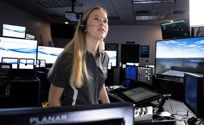 Embry-Riddle student Hailee Williamson, who is earning her bachelor’s degree in Air Traffic Management, trains in the university’s Tower Lab.