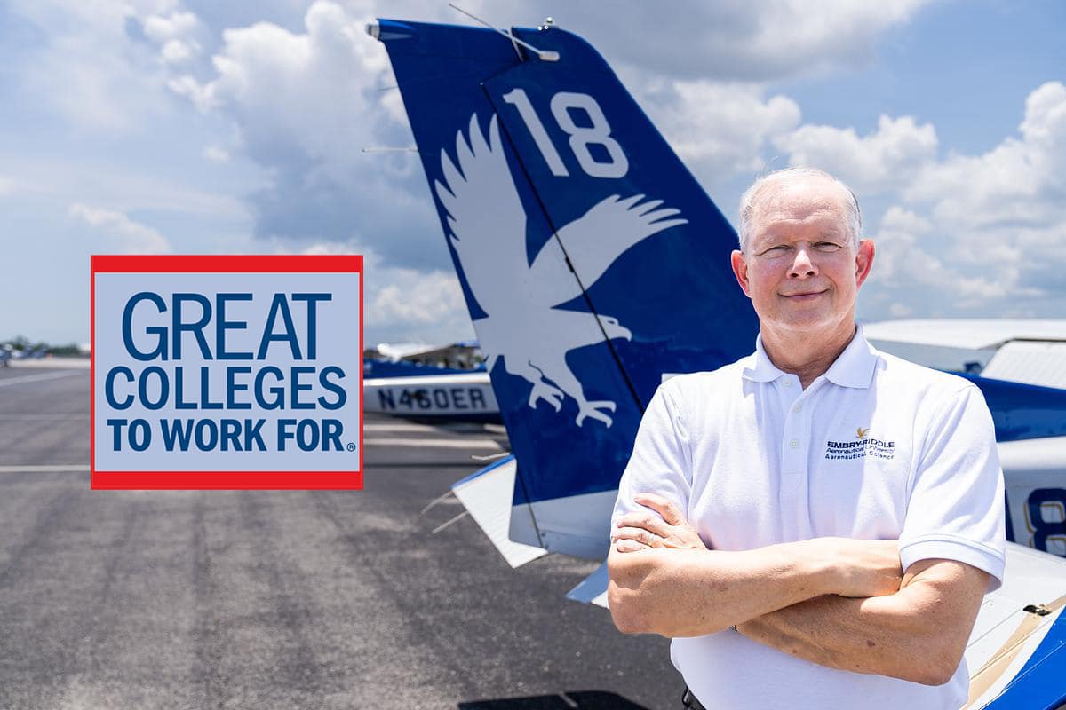 Man stands by a plane