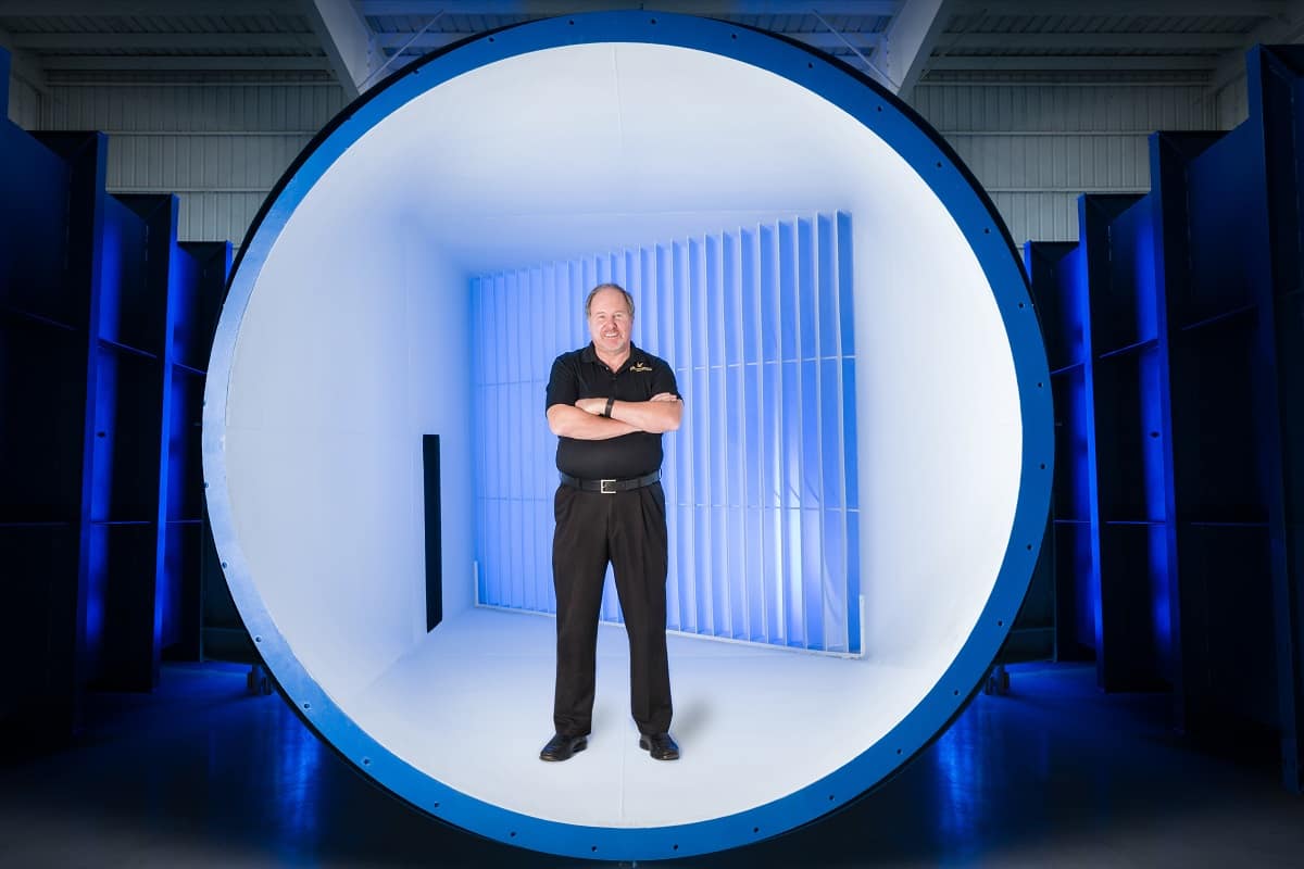 J. Gordon Leishman standing in a wind tunnel at the Embry-Riddle Research Park.