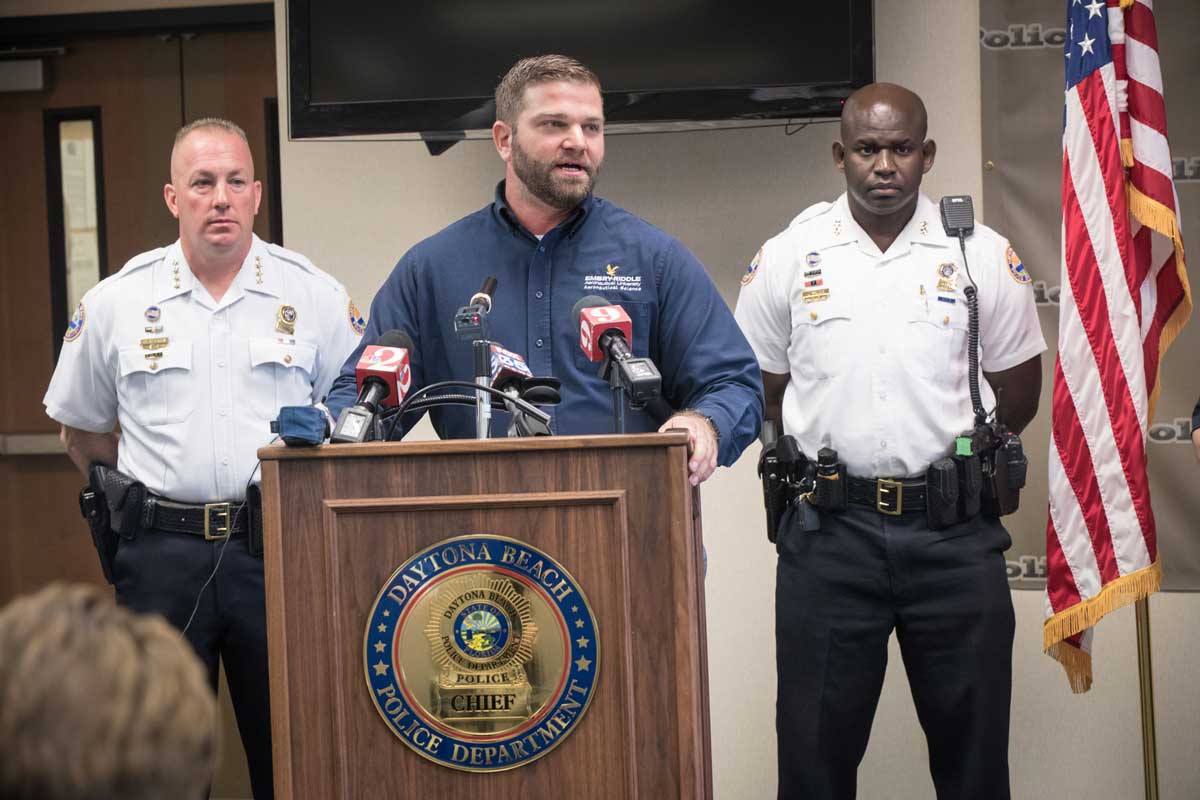 Embry-Riddle's Anthony Galante (center) took part in a 2018 press conference regarding the Daytona Beach Police Department's use of UAS. Shown with Galante are DBPD Chief Craig Capri (at left) and Deputy Chief Jakari Young. 