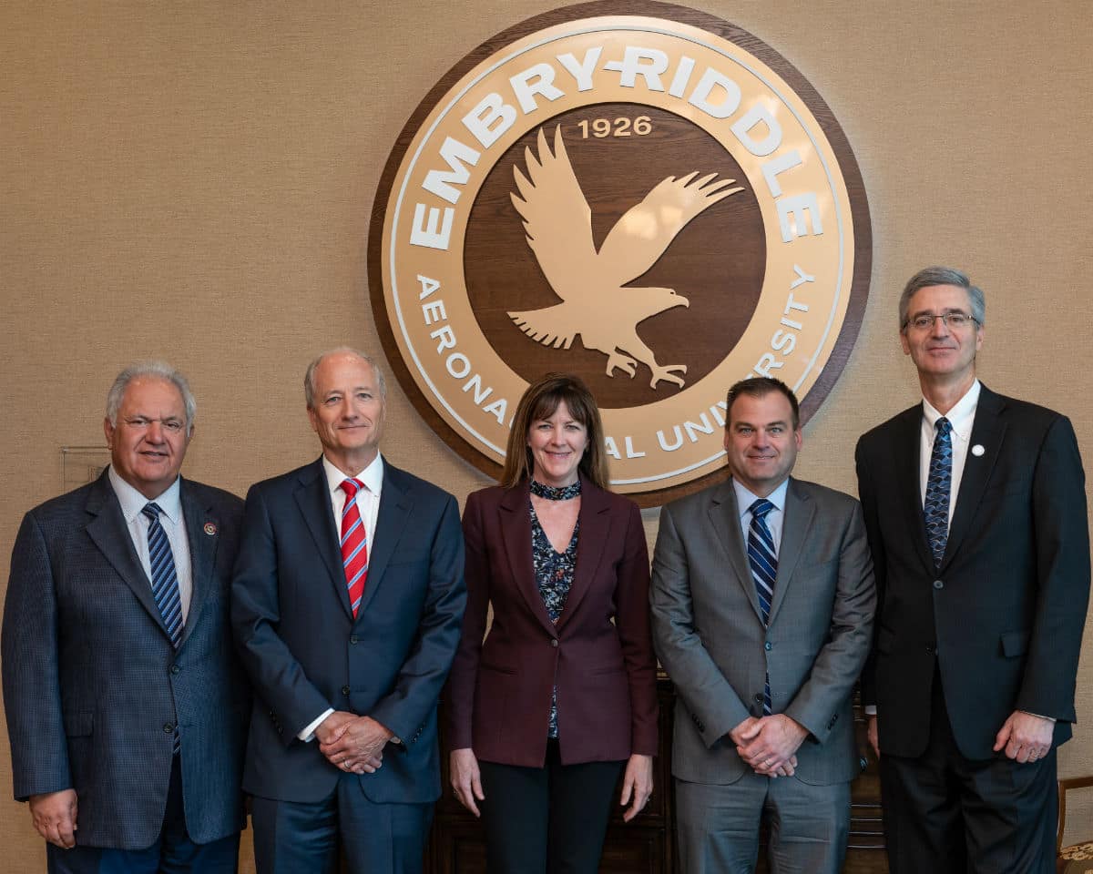 Mr. Mori Hosseini (left), Chairman of Embry-Riddle’s Board of Trustees, and President P. Barry Butler (right) welcome new Trustees Neal J. Keating, Dr. Janet Kavandi and Steve Nordlund.