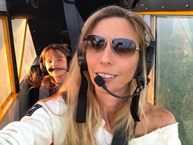 Dr. Carolina Anderson, associate professor of aeronautical science at Embry-Riddle, enjoys a flight with her daughter. Dr. Anderson’s many accomplishments include being the first woman to receive a Ph.D. in Aviation.