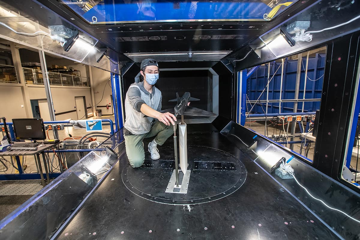 One of six Embry-Riddle students to earn a scholarship from the U.S. Department of Defense this year, Ph.D. student Nicholas Zhu conducts research on experimental aerodynamics in the subsonic wind tunnel on Embry-Riddle’s Daytona Beach Campus. (Photo: Embry-Riddle/David Massey)