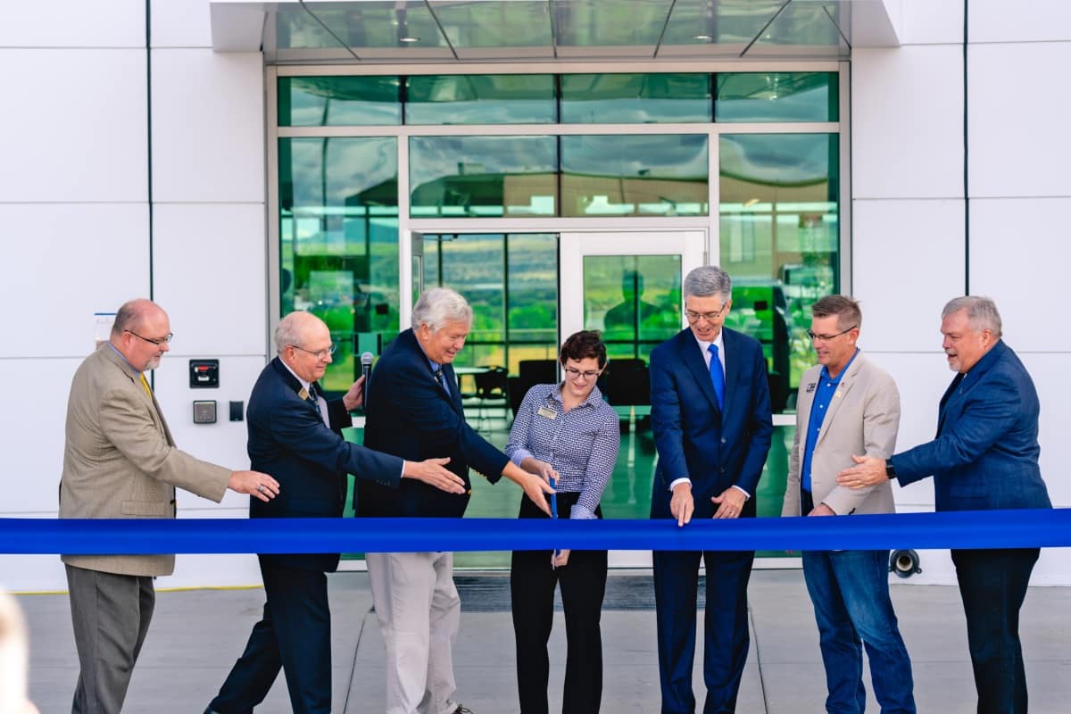 Embry-Riddle Dignitaries perform the ceremonial ribbon cutting to open Thumb Butte Suites on the Prescott Campus during OctoberWest Homecoming Week