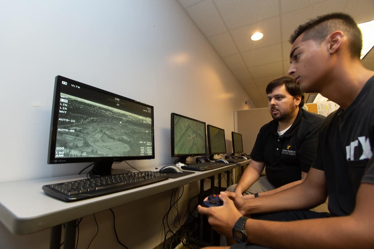 UAS Simulation and Flight instructor Billy Rose works with lab assistant, Justin Krupinski on the new Meta VR platform in the UAS Sim Lab, at Embry-Riddle's Daytona Beach Campus. 