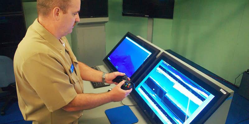 A sailor tests using an Xbox controller at a lab in northern Virginia.