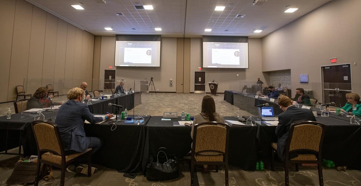 The Florida Cybersecurity Task Force meeting took place with full safety measures in place, including plastic barriers and social distancing.