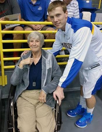 Rita Campos with an Embry-Riddle basketball player