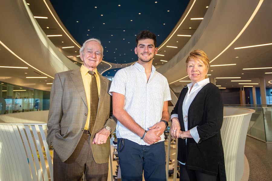 Professor Emeritus Charles Otis, current scholarship recipient Samson Del Torto and Otis’ daughter and alumna Christine Ison (’82, ’89). Photo by Dave Massey.