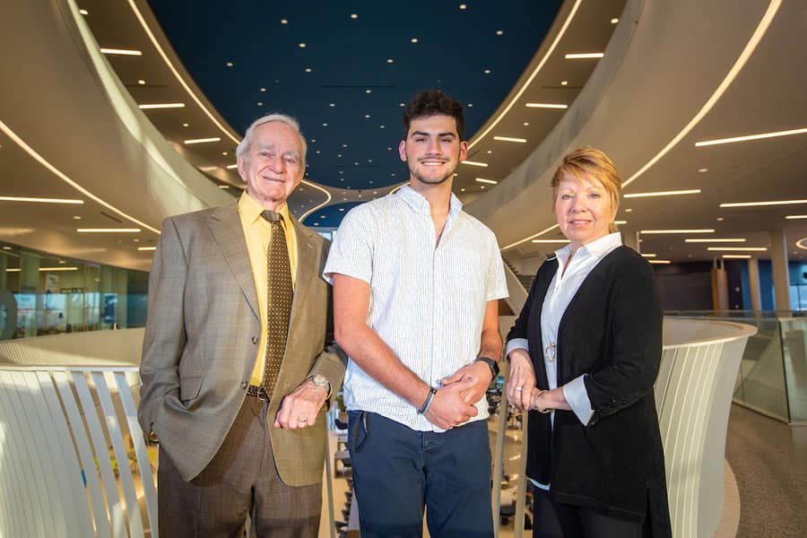  Professor Emeritus Charles Otis, current scholarship recipient Samson Del Torto and Otis’ daughter and alumna Christine Ison (’82, ’89). Photo by Dave Massey.