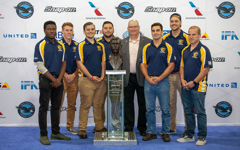 AMS team at trophy ceremony, with Tristan Anderson