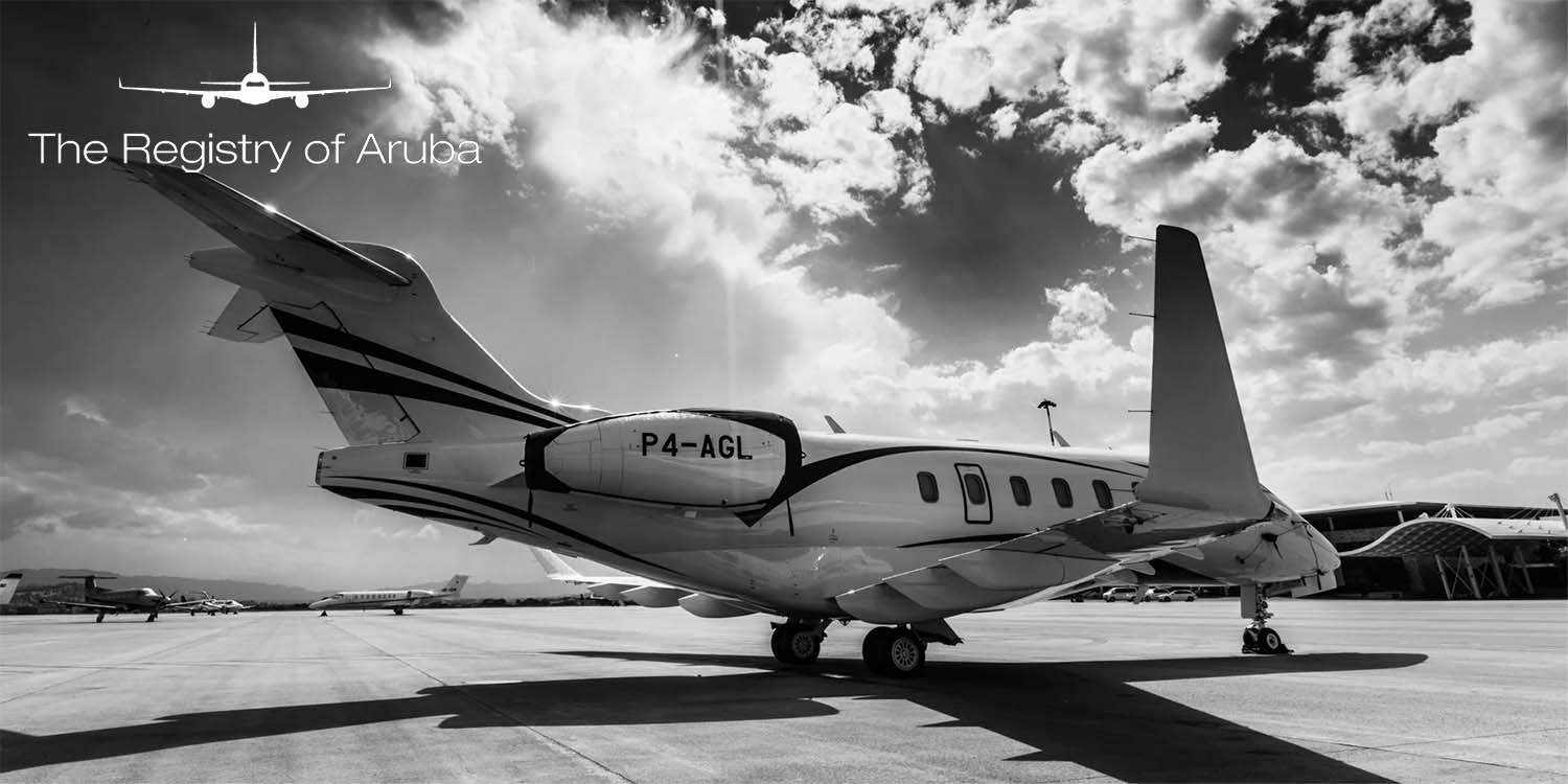 a small twin-engine passenger jet at an airport