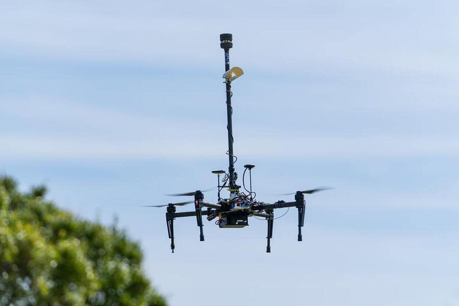 A drone hovers over a soccer field