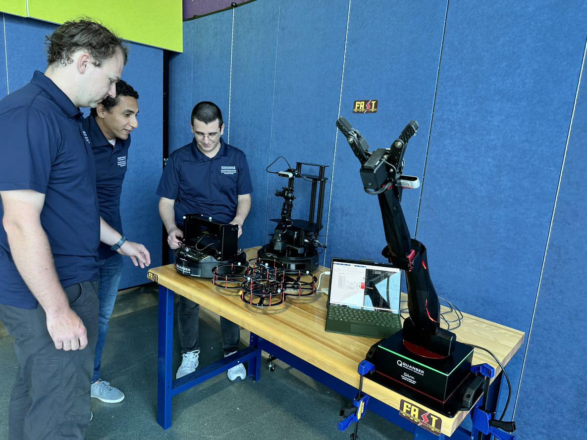 Students Atahan Kurttisi, Islam Aly and Andrew Bray are working on a robotic arm for use in space, as part of a faculty-led research project at Embry-Riddle.