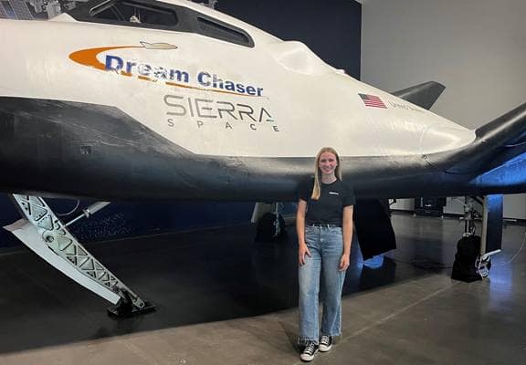 Recent alumna Grace Robertson works as a systems engineer on the Dream Chase spaceplane at Sierra Space.