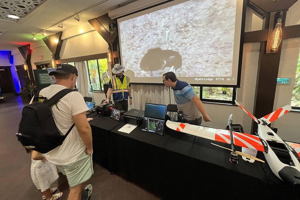 Brevard Zoo guests learn from Embry-Riddle students Sean Nolan and Tyler Deal at the Science Sunday event