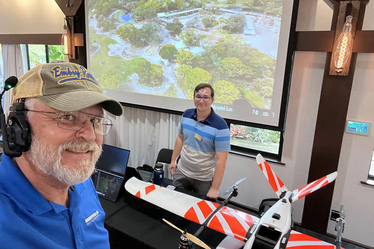 Dr. Dan Macchiarella and Embry-Riddle student Tyler Deal greet guests at Science Sunday at the Brevard Zoo