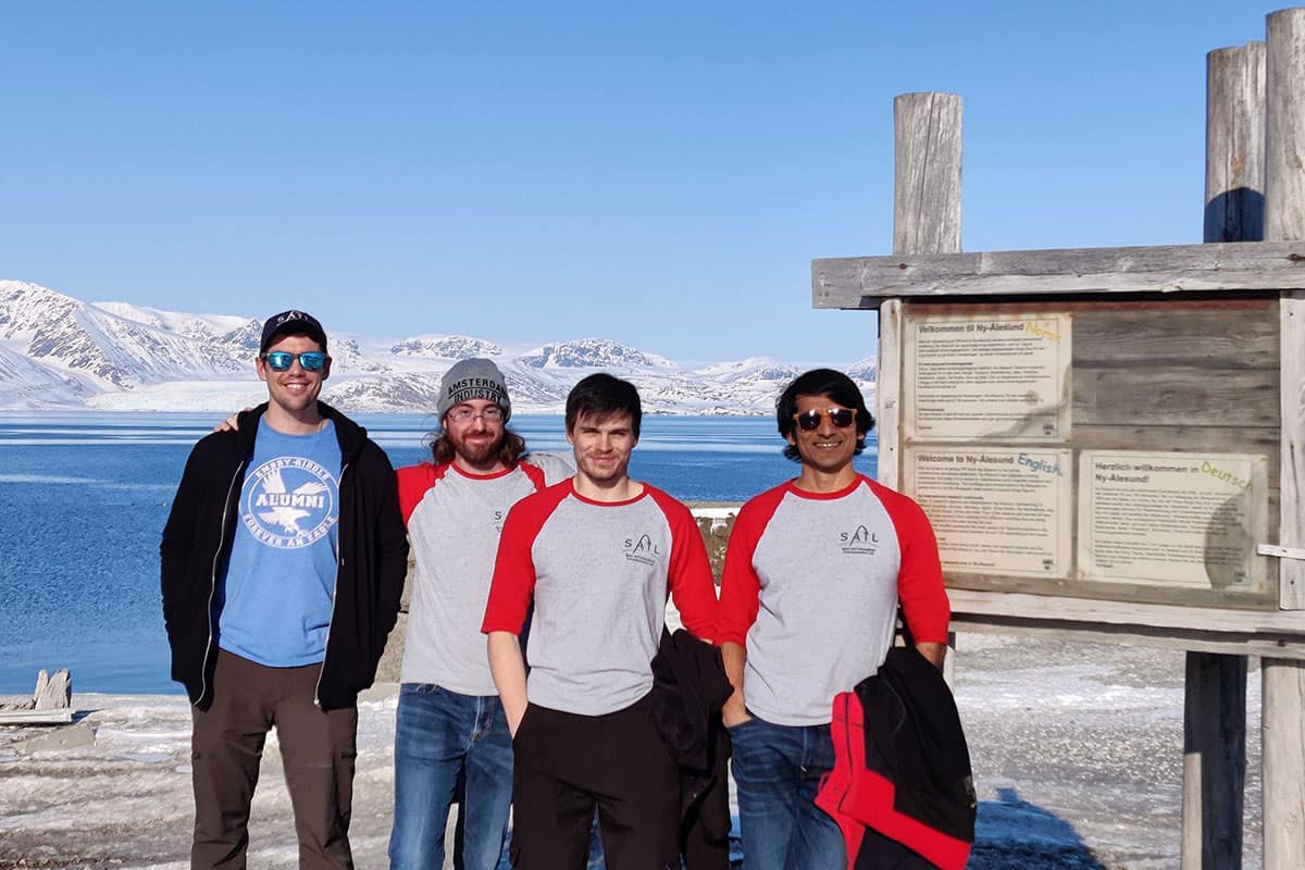 Embry-Riddle collaborators on a major NASA discovery included (L-R): Henry Valentine, Dr. Robert Clayton, Nathan Graves and Dr. Aroh Barjatya, shown here in Ny Ålesund, Norway, where they participated in NASA sounding rocket launches. Valentine and Graves are now doctoral students at Embry-Riddle. Not shown are two other Embry-Riddle team members, doctoral student Rachel Conway and research scientist Dr. Shantanab Debchoudhury.