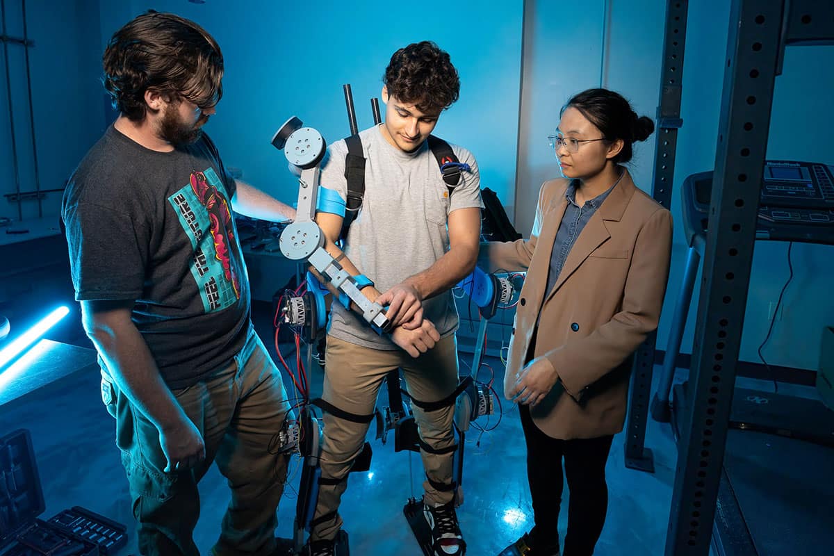 Edward Aleksi with fellow student Bryan Gonzalez (left) and Dr. Shuzhen Luo