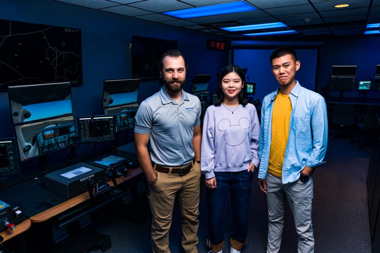 Research team Kyle Wilkerson, Amanda Zhu ('23) and Daniel Chiu ('23) developed an immersive program for international flight students to improve their radio communication skills. (Photo: Embry-Riddle/Connor Mcshane).