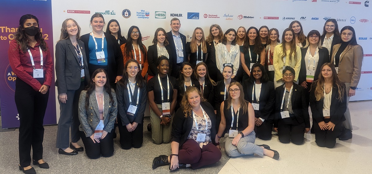 Embry-Riddle Society of Women Engineers (SWE) team members pose with James Gregory, dean of the College of Engineering, and Claudia Ehringer Lucas, SWE faculty advisor