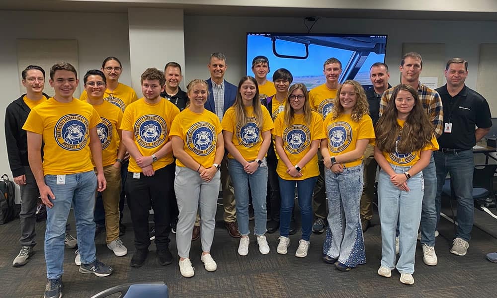 Students from Embry-Riddle’s Prescott Campus pose with faculty from the Collins Aerospace facility in Cedar Rapids, Iowa.