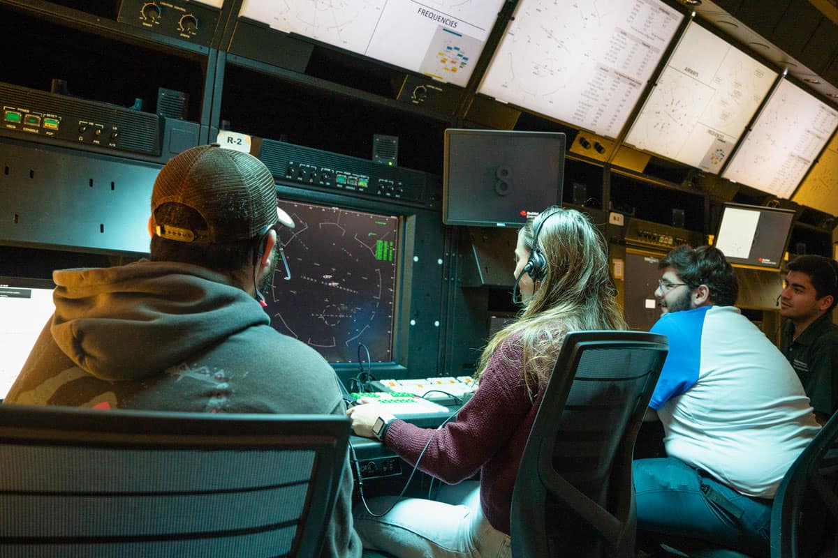 Air Traffic Management students work in Embry-Riddle’s Terminal Radar Approach Control (TRACON) Lab, which integrates a simulation of the airspace used in training at the FAA Air Traffic Controller Academy.