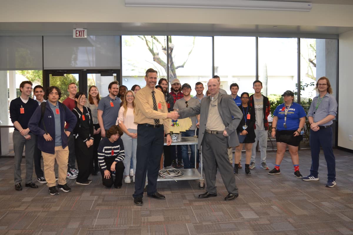 James and his students meet with Honeywell Senior Engineering Manager Levi Brown to celebrate the IntuVue RDR-7000 radar partnership between Embry-Riddle and Honeywell.