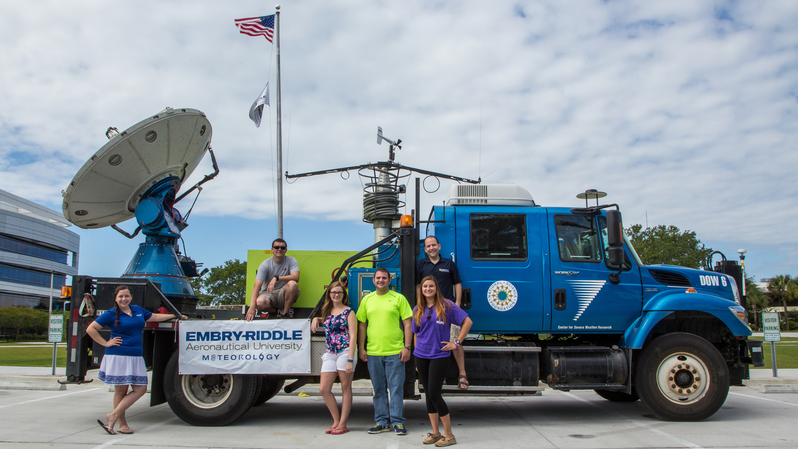 Dr. Shawn Milrad’s and students pose with the Doppler on Wheels truck 