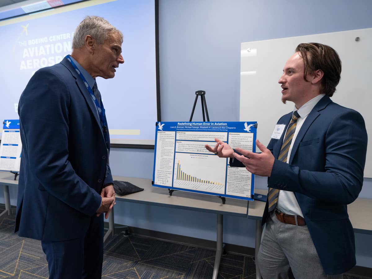 Liam Brennan, who is pursuing a Ph.D. in Human Factors, presents his research poster at the Boeing Center for Aviation and Aerospace Safety’s second annual Safety Research Symposium.