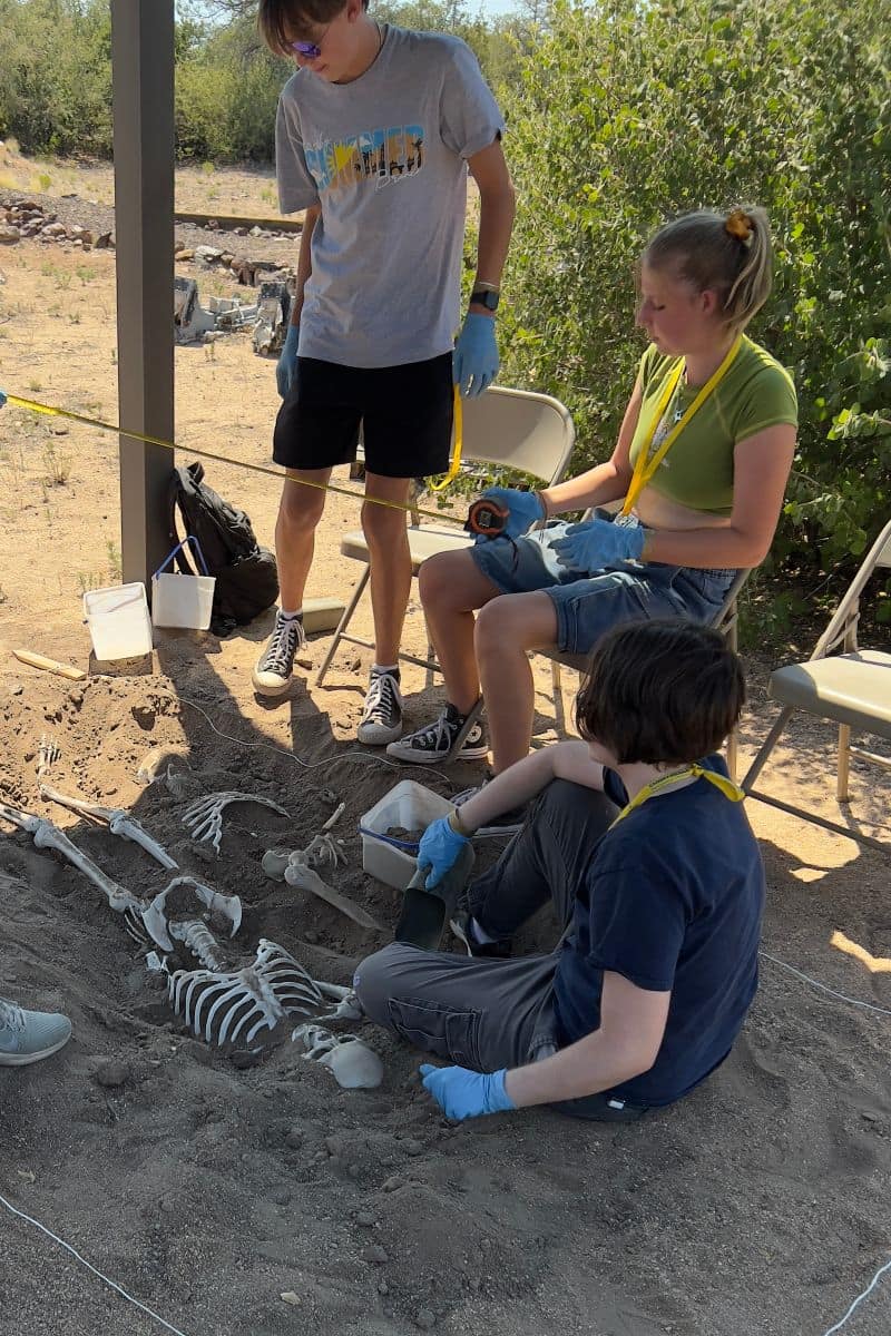 High school students participate in a simulated excavation during a forensic science summer camp at Embry-Riddle Aeronautical University’s Prescott Campus. 