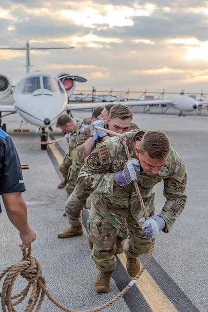 ROTC students pull small plane