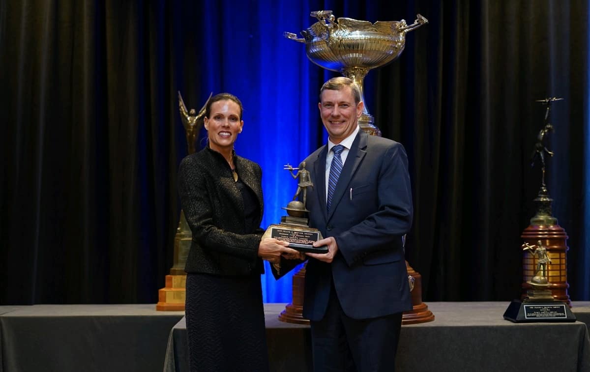 College of Engineering Dean Jim Gregory accepts the Frank G. Brewer Trophy for excellence in aerospace education from the National Aeronautics Association. 
