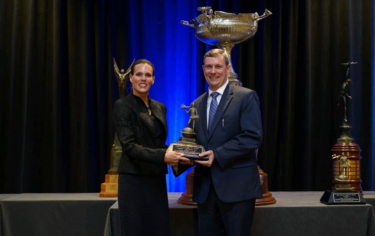 College of Engineering Dean Jim Gregory accepts the Frank G. Brewer Trophy for excellence in aerospace education from the National Aeronautics Association.