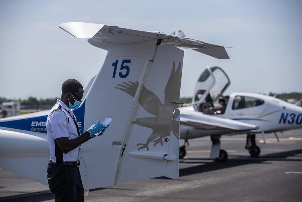 Pilot wears a mask on the flightline