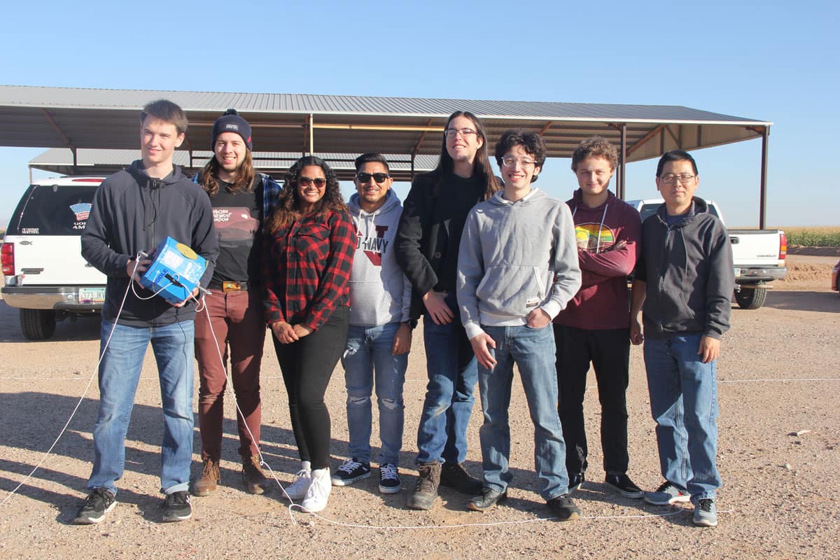 ASCEND team at the launch site. From left to right: Ben Knoell, Zach Howe, Somaralyz Grullon, Kevin Zamora, Ken Bee, Nicodemus Phaklides, Julian Turner and Dr. Yabin Liao