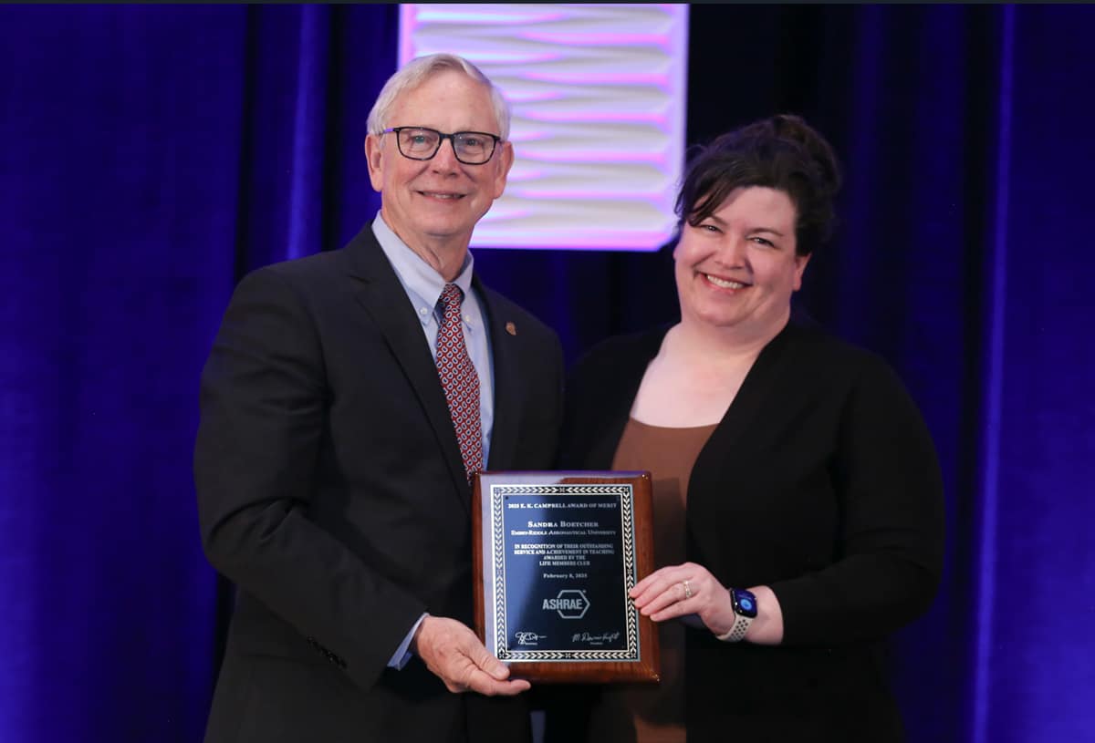 ASHRAE President M. Dennis Knight, P.E. (left) presents Dr. Sandra Boetcher with the E.K. Campbell Award of Merit.