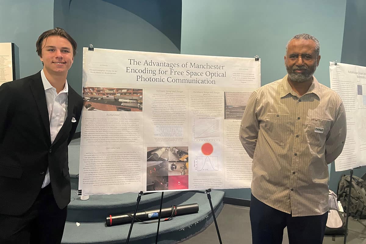 Engineering Physics student Timothy Van Ryn stands with his mentor Dr. Bereket Berhane