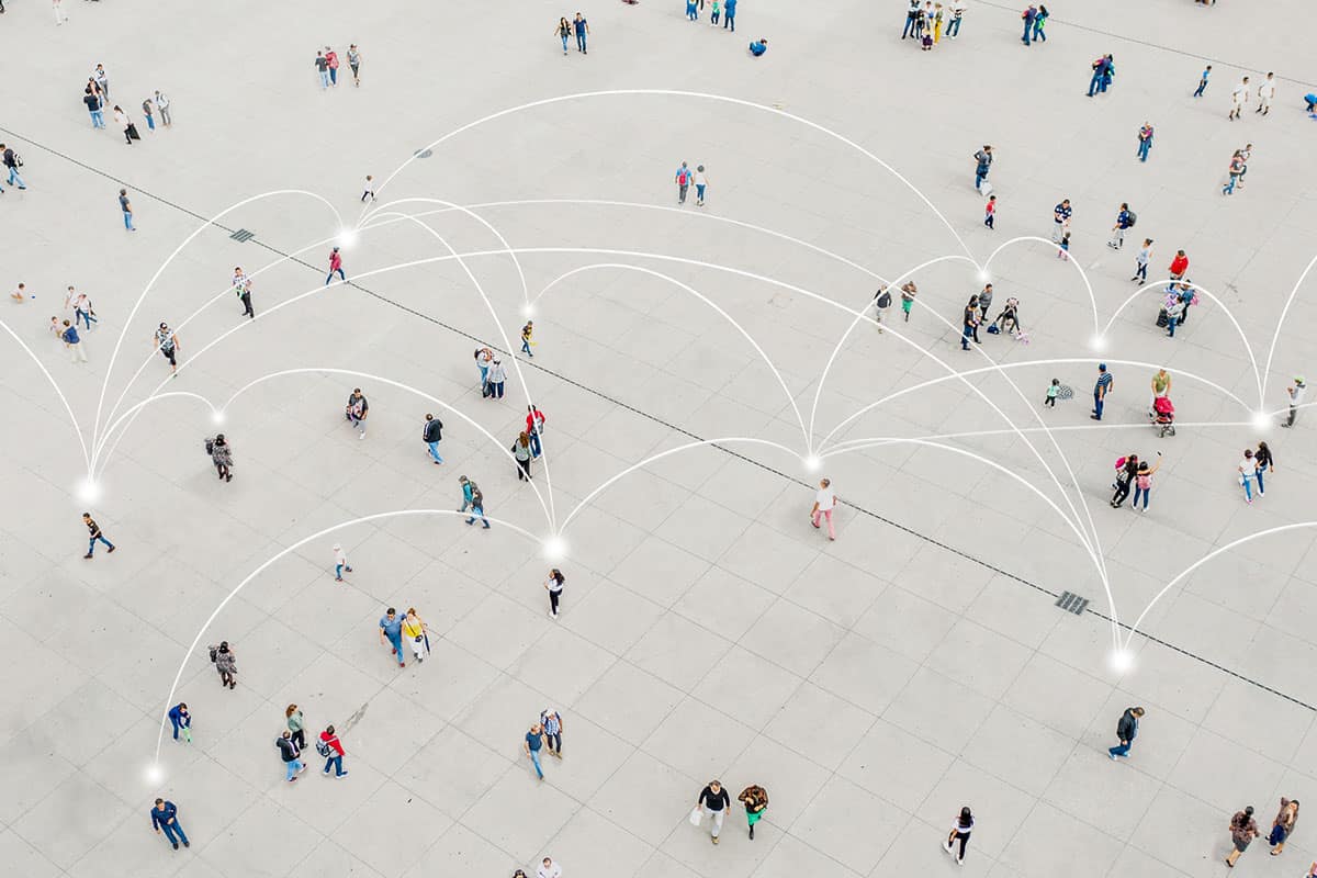 Overhead shot of people walking around a plaza