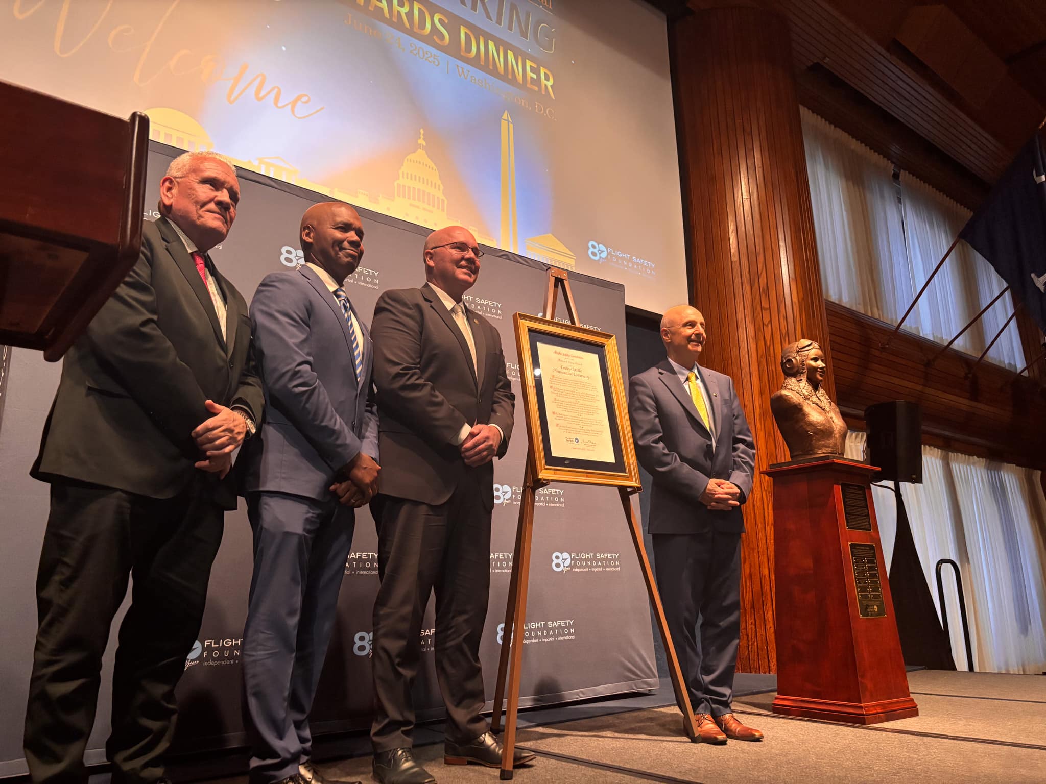 Gilberto López Meyer, chair of the FSF Board of Governors and Senior Vice President, Corporate Aviation Safety and Security at Aeromexico; Captain Houston Mills, member of the FSF Board of Governors and President, Flight Operations and Safety at UPS Airlines; Dr. Ken Witcher, chancellor of Embry-Riddle's Prescott Campus; and Dr. Hassan Shahidi, president and CEO of the Flight Safety Foundation.