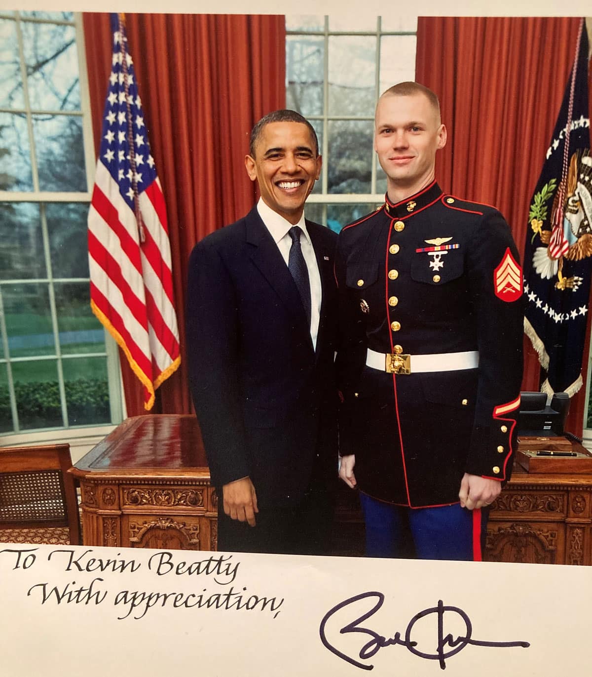 Soldier stands with Barack Obama