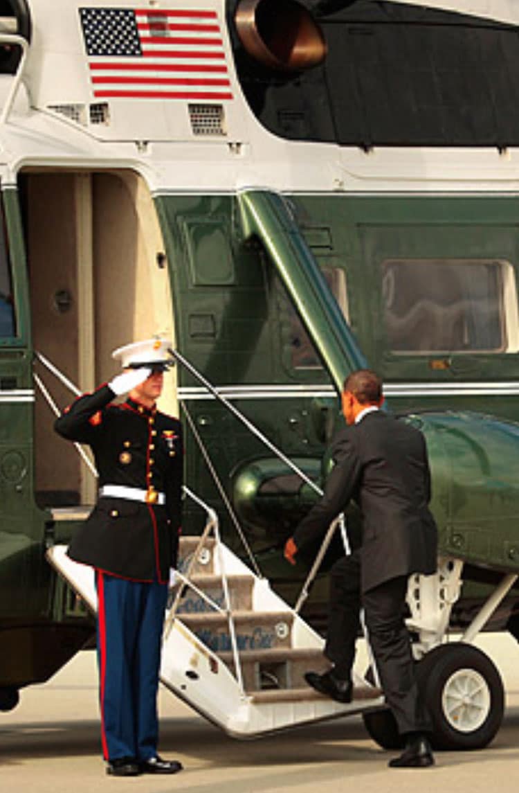 President Barack Obama getting on a helicopter