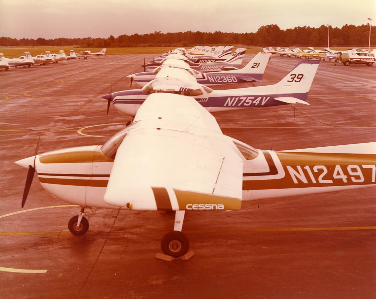 Several Cessna 172s on flight line in 1970s