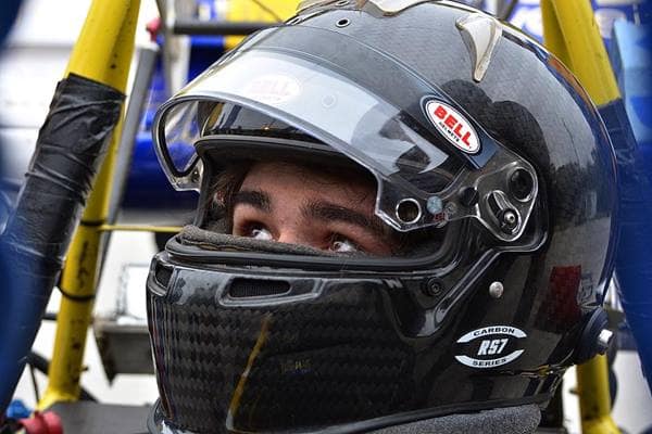 Racecar driver in helmet
