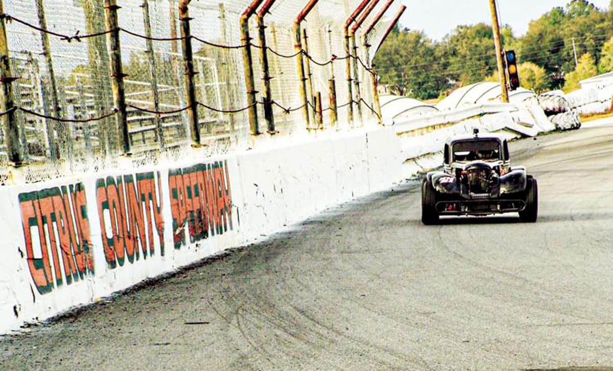 Racecar drives around track