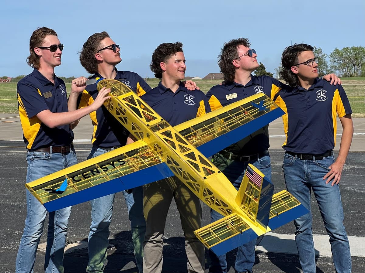 Embry-Riddle students from the Daytona Beach and Prescott campuses recently competed at the American Institute of Aeronautics and Astronautics’ Design, Build, Fly competition. Noah Pecor, Riley Cox-Gross, Joseph Ayd, Alexander Roy, Frederick Kennedy, all of the of the Daytona Beach Campus team (pictured here), cut their hair into mullets, representing their aircraft’s name, MULLET (Medical Unmanned Low-Level Electric Transport).