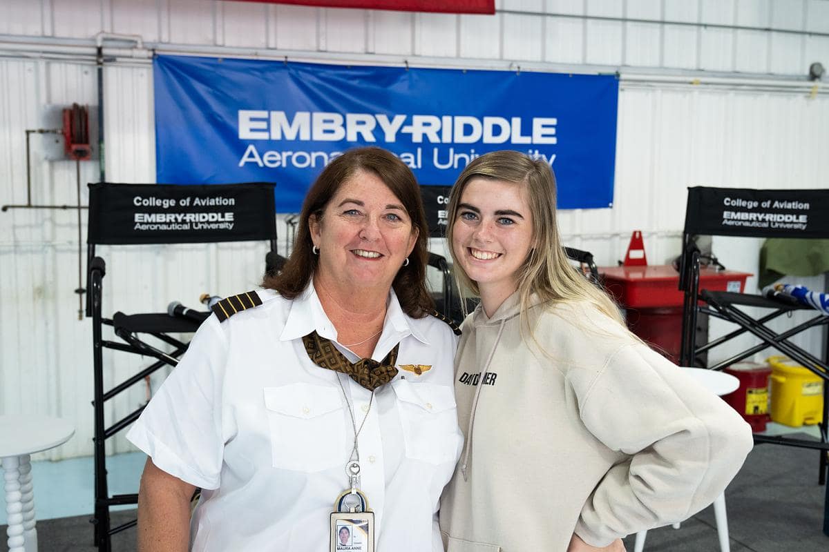 Embry-Riddle alumna Maura Schmid (‘84) poses with her daughter, Flight student Caroline Schmid
