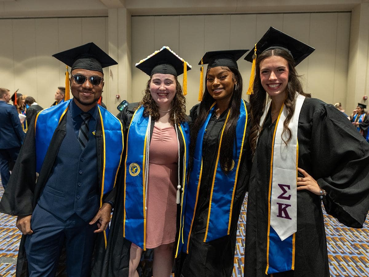 College graduate spose for a picture