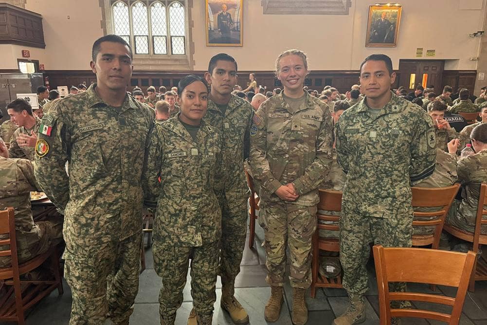 Eagle Battalion Cadet Barrett Cutshall with cadets from the Mexico team